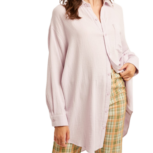 Lavender Gauze Textured Shirt Dress.  - Gauzed Texture  - Textured cotton woven fabric - Button closure on center front - Shirt Dress - Collared  - Long sleeves with buttons on cuffs - Patch pocket on chest - Mid length - Curved hem