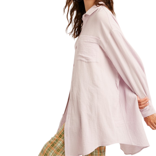 Lavender Gauze Textured Shirt Dress.  - Gauzed Texture  - Textured cotton woven fabric - Button closure on center front - Shirt Dress - Collared  - Long sleeves with buttons on cuffs - Patch pocket on chest - Mid length - Curved hem