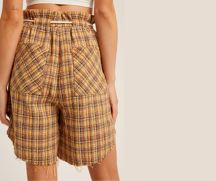 Plaid Textured Long Shorts with Curved Raw Edge & Drawstring  - Multi plaid cloth textured curved raw hem shorts  - Plaid printed textured woven fabric  - Paper bag waist with contrast tie string  - Side seam pockets  - Curved raw hem